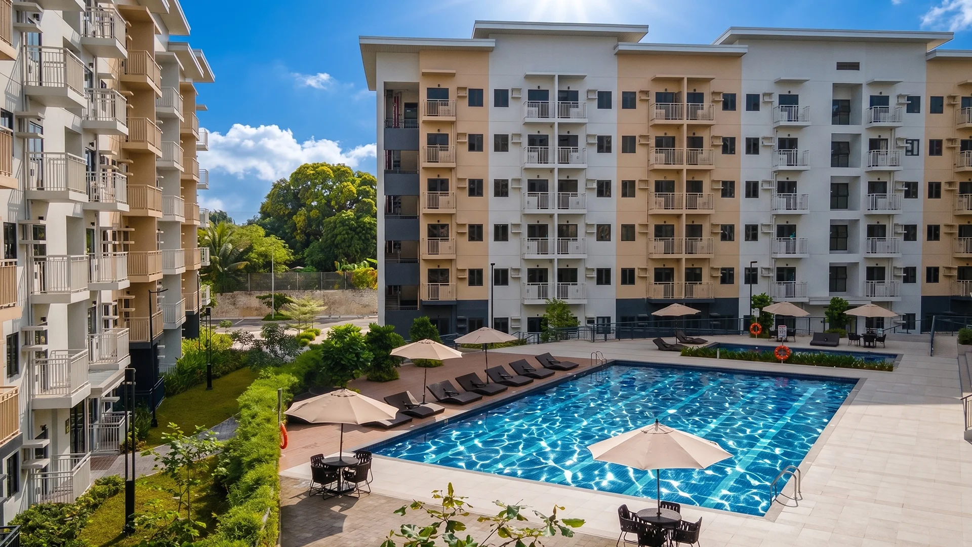 The amenity area at Hill Residences features a swimming pool and open leisure spaces designed for relaxation and everyday use within the community.