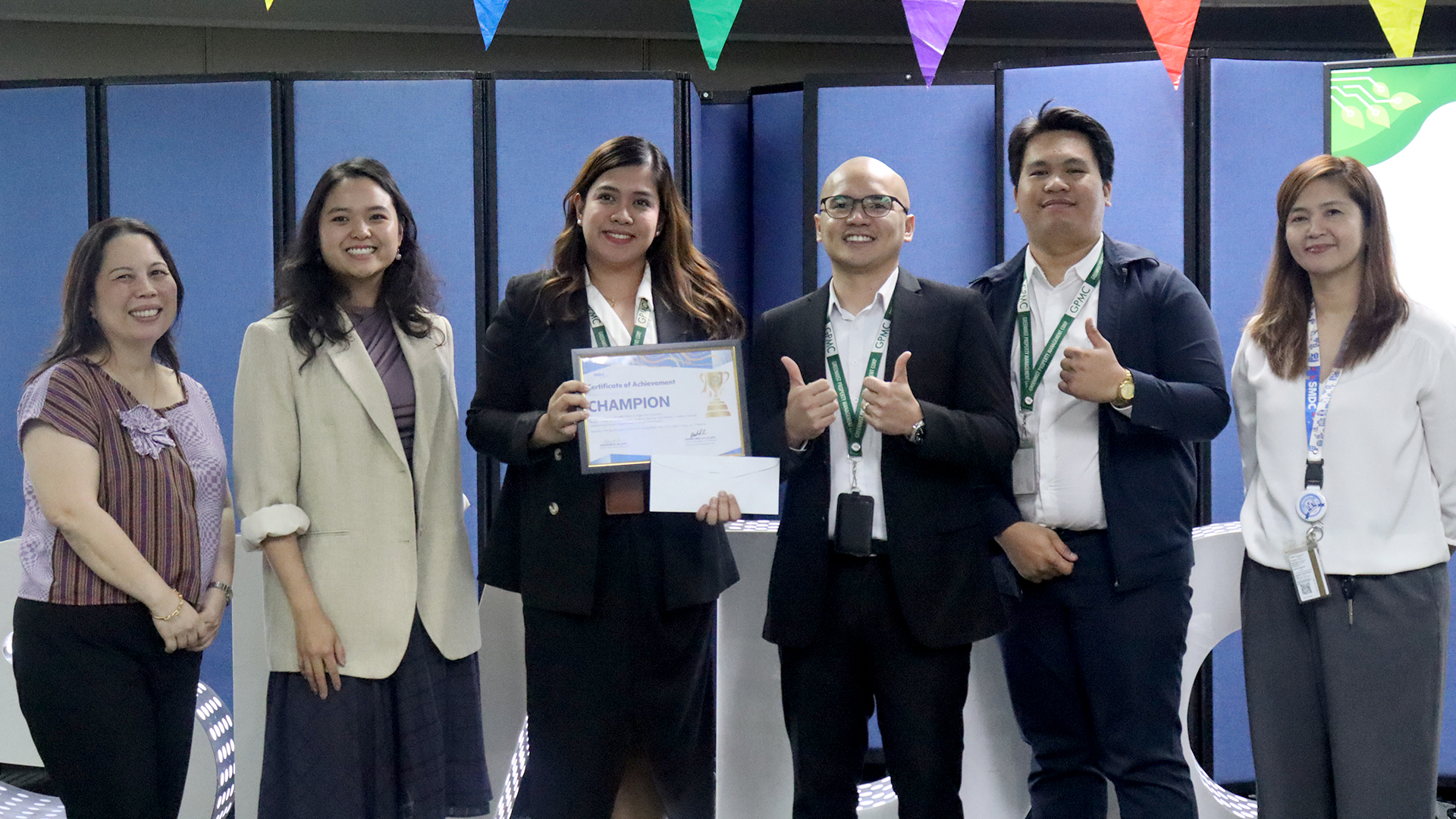 VP and Head of Design, Innovation and Strategy Jessica Bianca Sy, together with SMDC employees