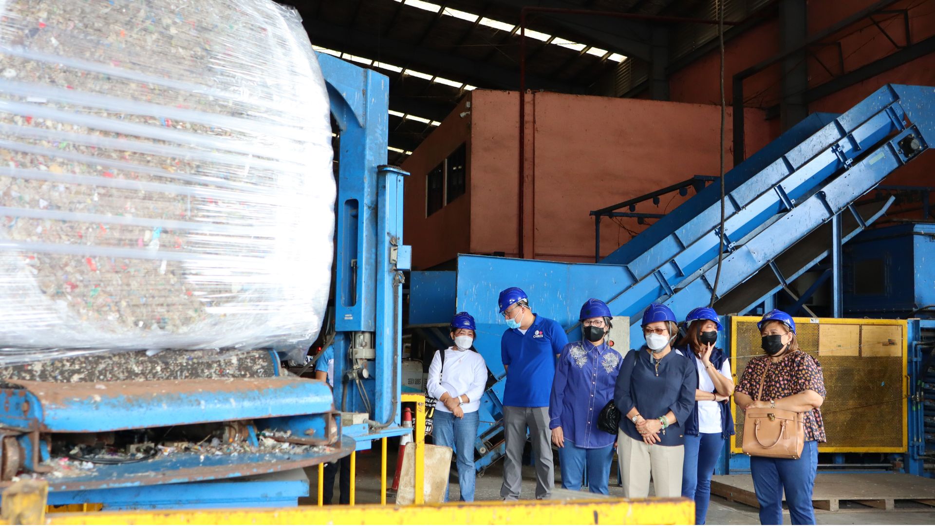 SM GUUN is piloting a Singaporean system in its malls, transforming compostable food waste into nutrient-rich soil within 48 hours, reducing landfill waste and enriching urban green spaces. 